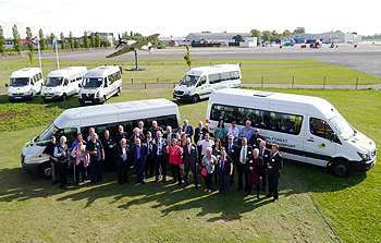 EF Community Transport buses.